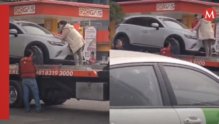 mujer se 'trepa' a grua para evitar que se llevaran su camioneta en monterrey | video